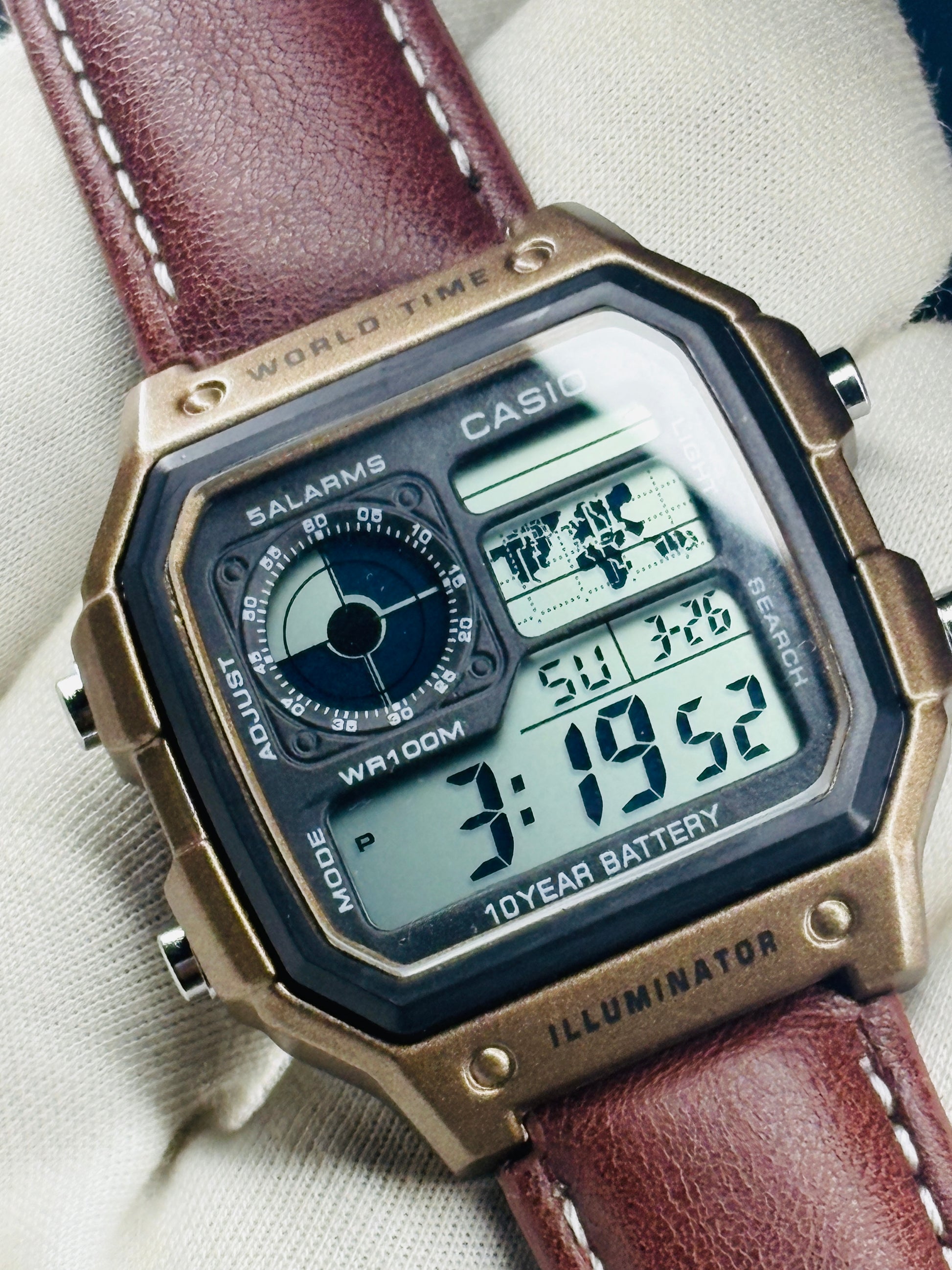Retro world time digital watch with world map display – ZENO